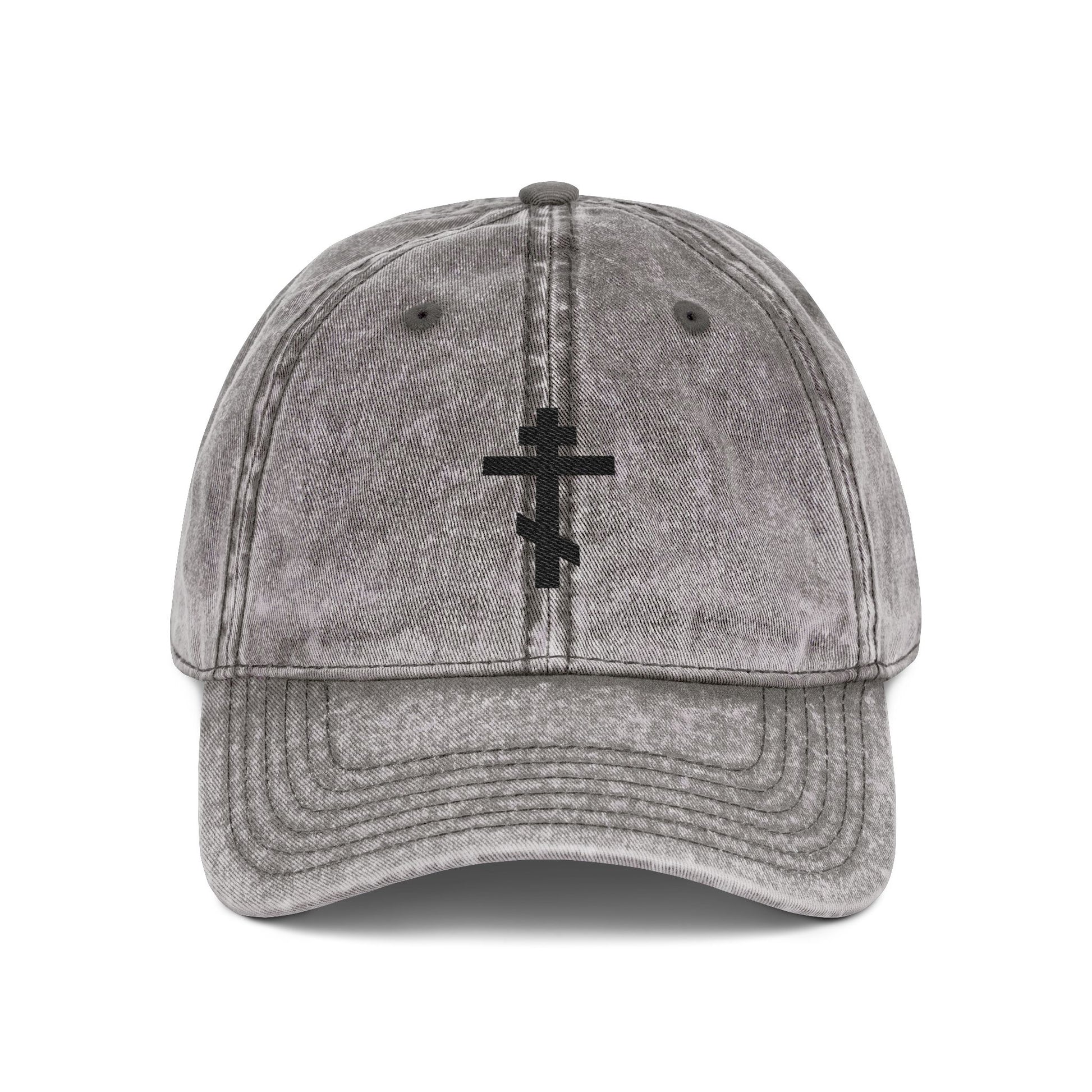 Charcoal grey distressed cap featuring a minimalist black Orthodox TriBar Cross, inspired by Christian faith. "Crucify My Ego to the Precious and Life Giving Cross" embroidered on front.