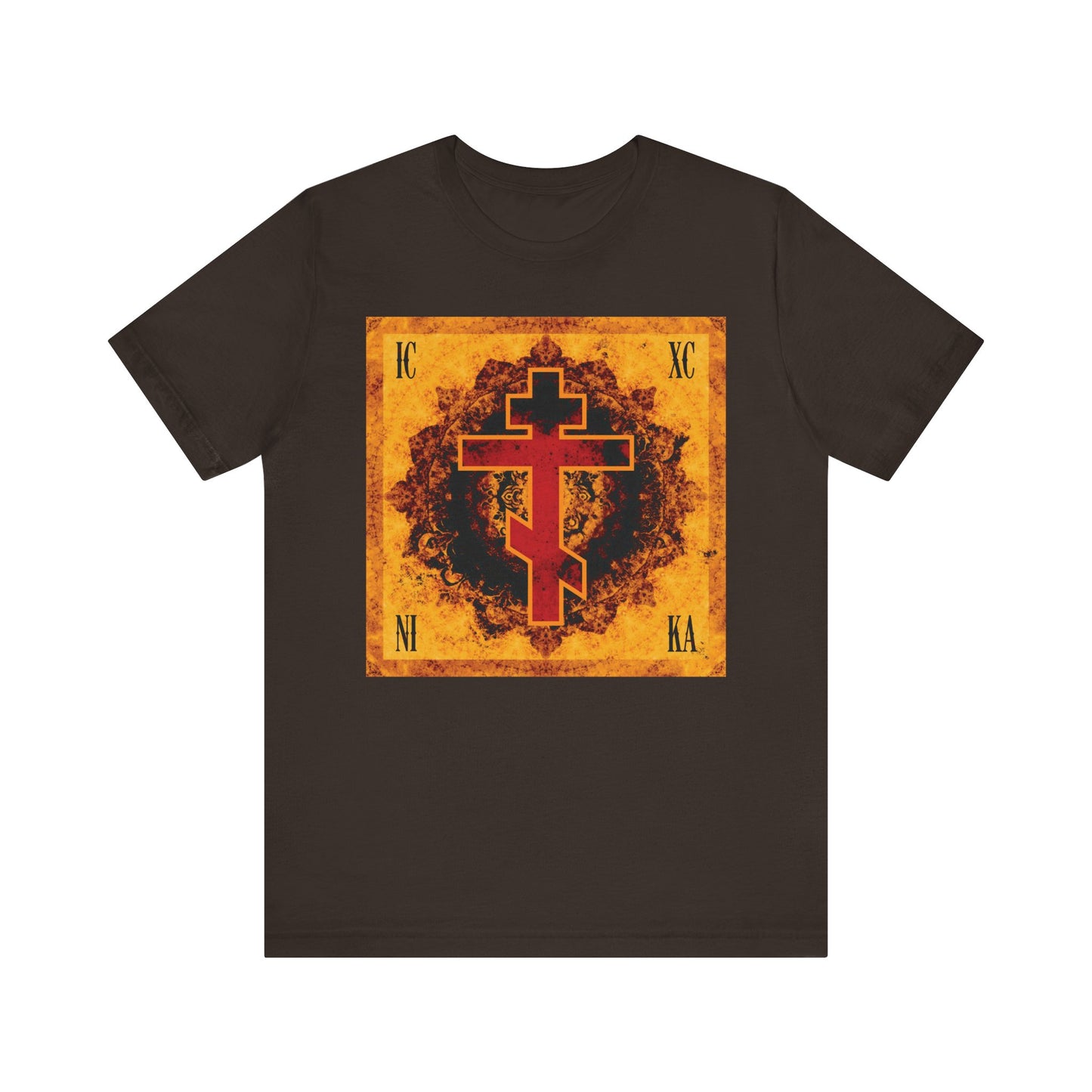 Brown t-shirt featuring the ICXC NIKA ornate bright orange and red Orthodox cross, set within a distressed yellow square with Greek letters at each corner—a striking tribute to the Elevation of the Precious Cross and traditional Orthodox devotion.