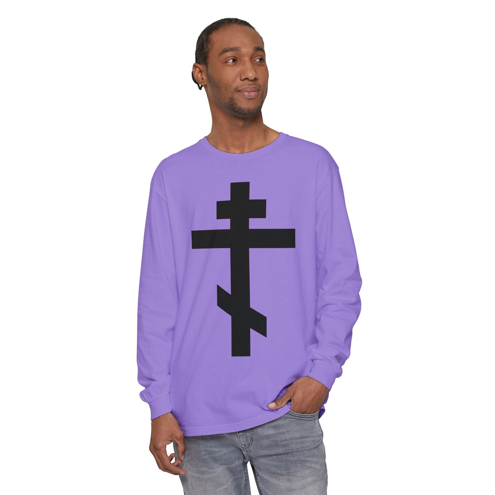 Man in a lavender Orthodox long sleeve shirt featuring a large black cross and “May I never boast, except in the cross of our Lord Jesus Christ” (Gal 6:14), inspired by St John Chrysostom’s Galatians commentary.