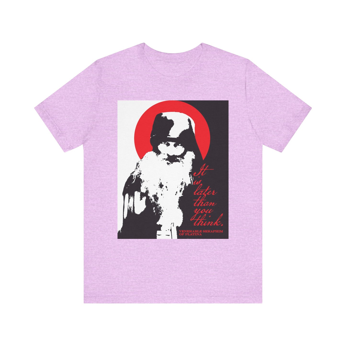 Heather Prism Lilac lightweight unisex cotton T-shirt featuring a high-contrast black, white, and red graphic of Fr. Seraphim Rose with the phrase "It's Later Than You Think"—a striking memento mori that nods to Orthodox spiritual life and the call for spiritual discipline.