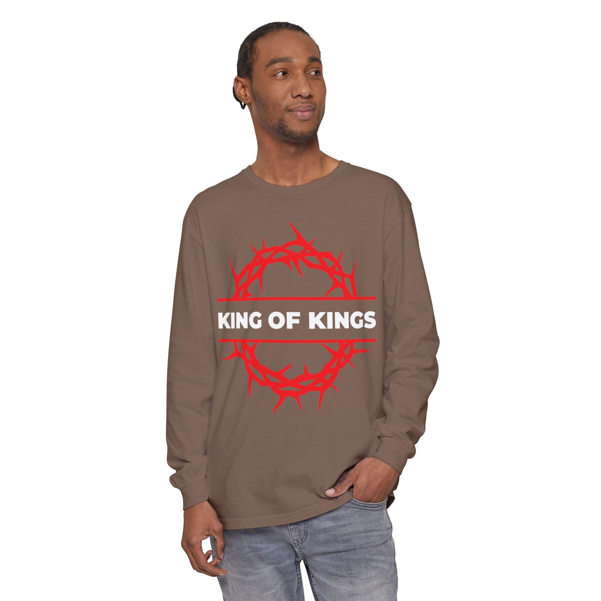 Man models the "King of Kings Crown of Thorns | The King of Glory | Christ is King | Revelation 19:16" Christian cotton long sleeve shirt, featuring a red crown of thorns graphic, against a white background.