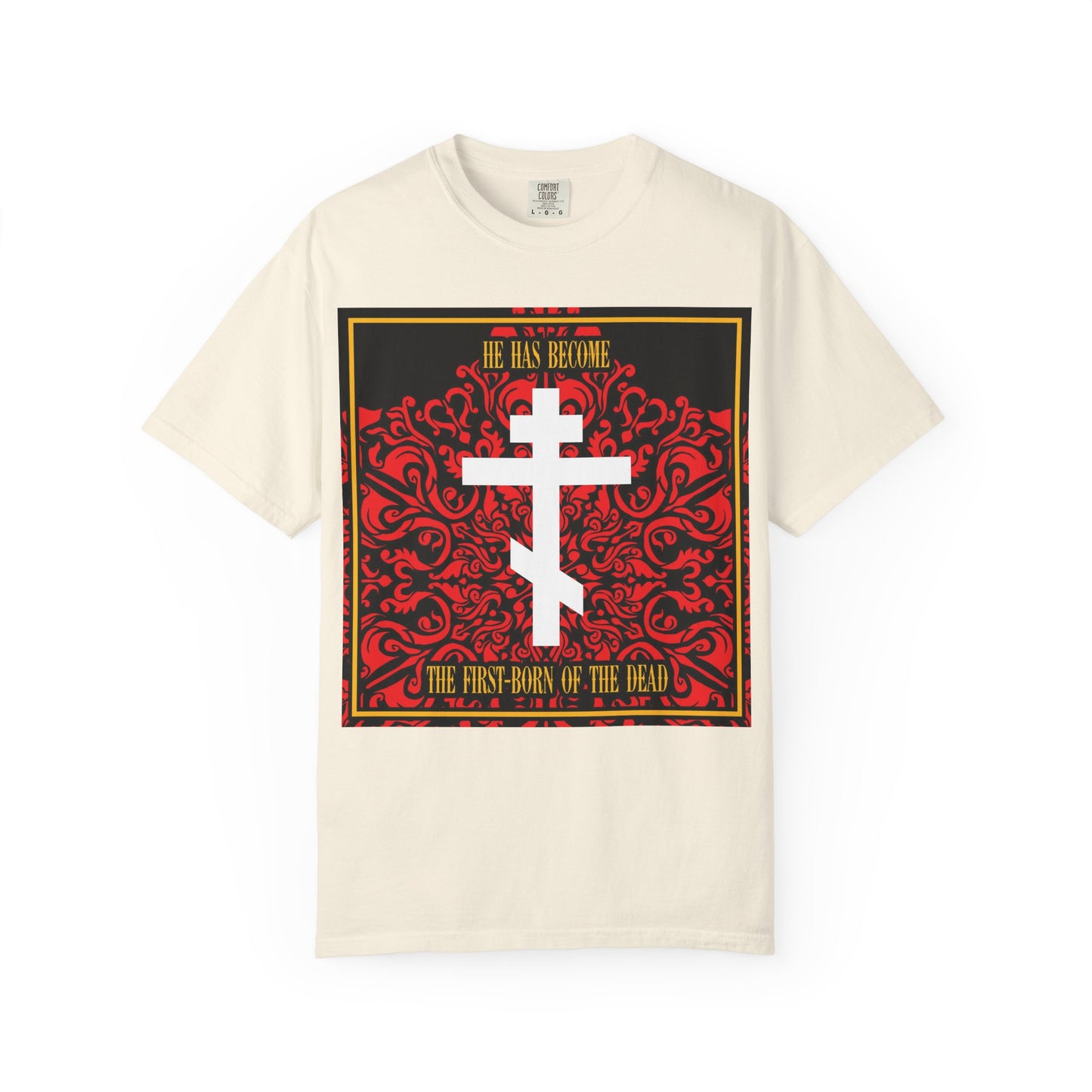 Ivory heavyweight cotton unisex tee featuring a white Orthodox cross over a red floral texture and the phrase “He Has Become the First-Born of the Dead”—this Christian T-shirt offers meaningful style and everyday inspiration, perfect as a Bible verse shirt.