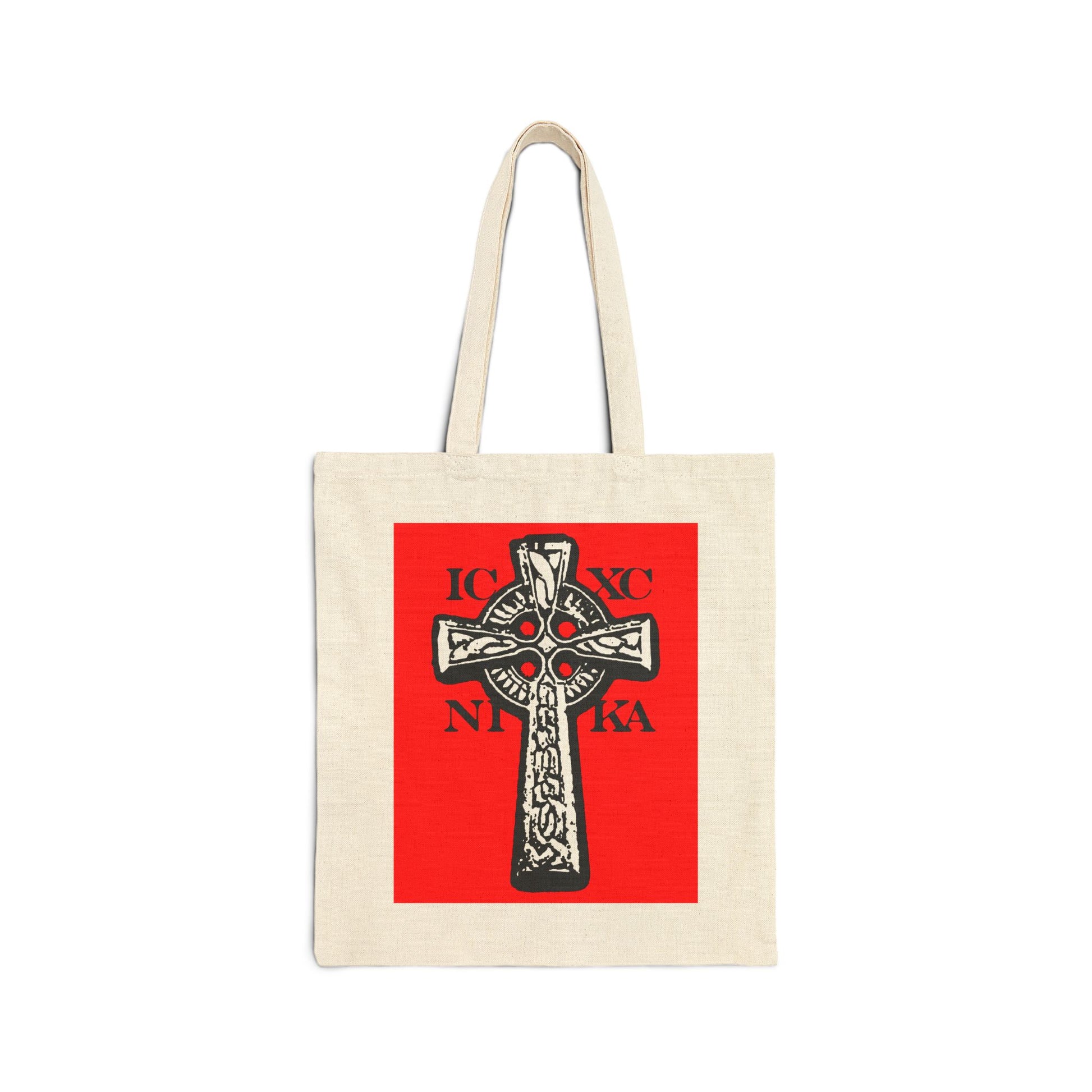 Natural tote bag with a red square displaying a black and white Celtic knotwork cross and the letters ICXC NIKA, symbolizing "Jesus Christ Conquers" in Orthodox Christian tradition.