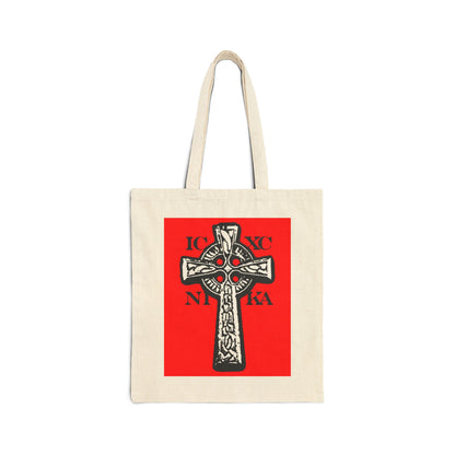 Natural tote bag with a red square displaying a black and white Celtic knotwork cross and the letters ICXC NIKA, symbolizing "Jesus Christ Conquers" in Orthodox Christian tradition.