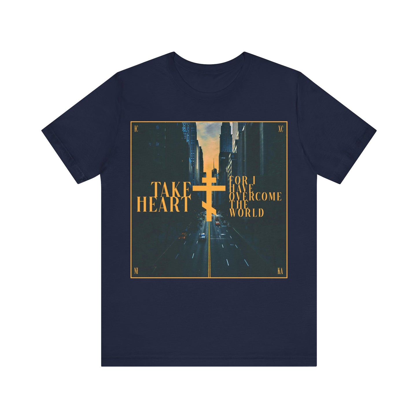 The Navy "Take Heart, For I Have Overcome the World" T-shirt features a modern city street scene and uplifting yellow text (John 16:33), blending Orthodox Christian faith with stylish comfort.