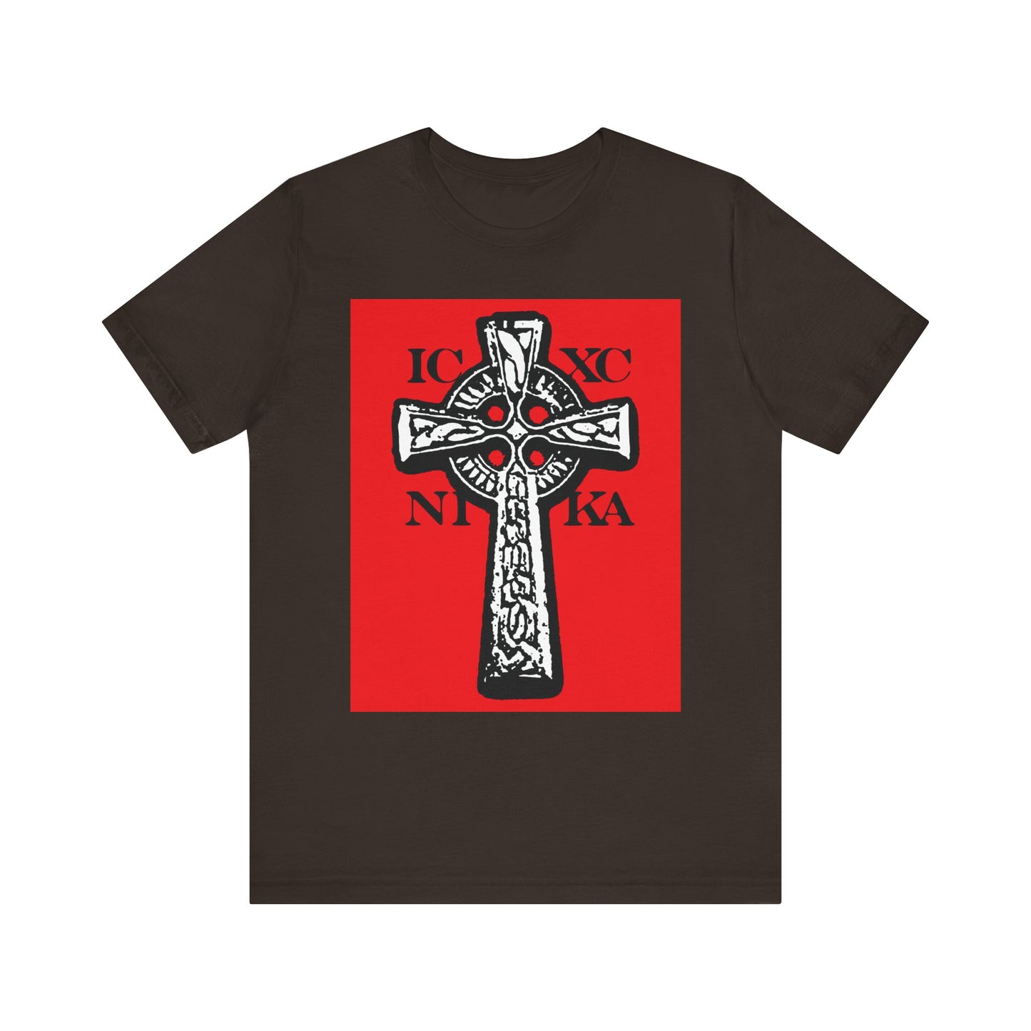 Brown t-shirt featuring a striking black and white Celtic knotwork cross graphic on a red background, with Greek letters spelling "ICXC NIKA"—Jesus Christ Conquers—encircling the Cross of our Saviour, invoking strength and redemption in the power of the Crucified.