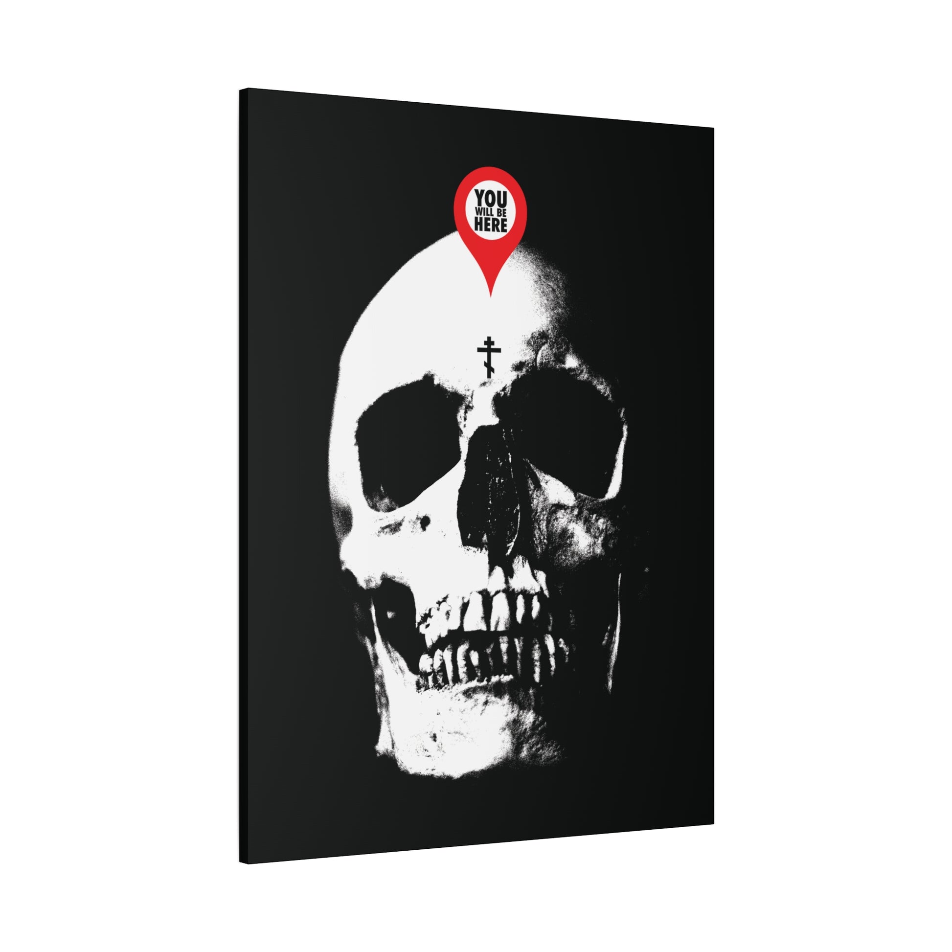 The "You Will Be Here Maps Marker on Skull" canvas art features a black and white skull with a red pin and "YOU ARE HERE," reminding viewers of mortality in the Orthodox Christian memento mori tradition.