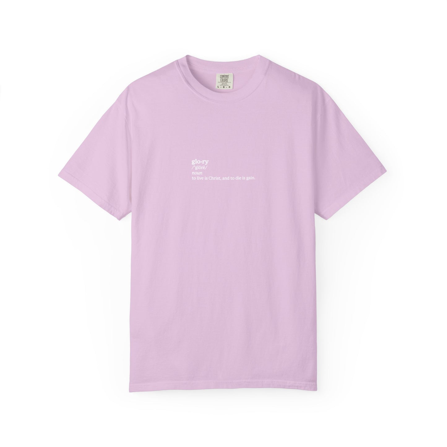 Orchid heavyweight cotton unisex tee with subtle white chest text: "To Live is Christ, to Die is Gain" (Phil 1:21), inspired by ascetic Christianity and memento mori. Displayed on a white background.