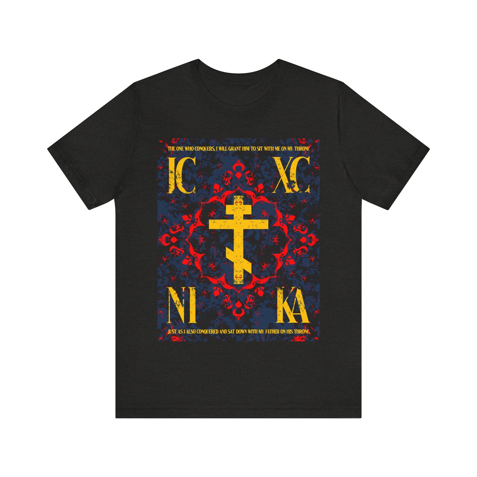 Black Heather "IC XC NIKA Orthodox Cross" t-shirt features a medieval floral design with gold letters and a cross, inspired by Revelation 3:21, highlighting God's grace and the call to conquer through faith.