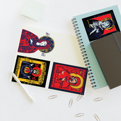 Theotokos IconoGraphic Sticker Collection No. 1 on a notebook with pens, paper clips, and other notebooks.