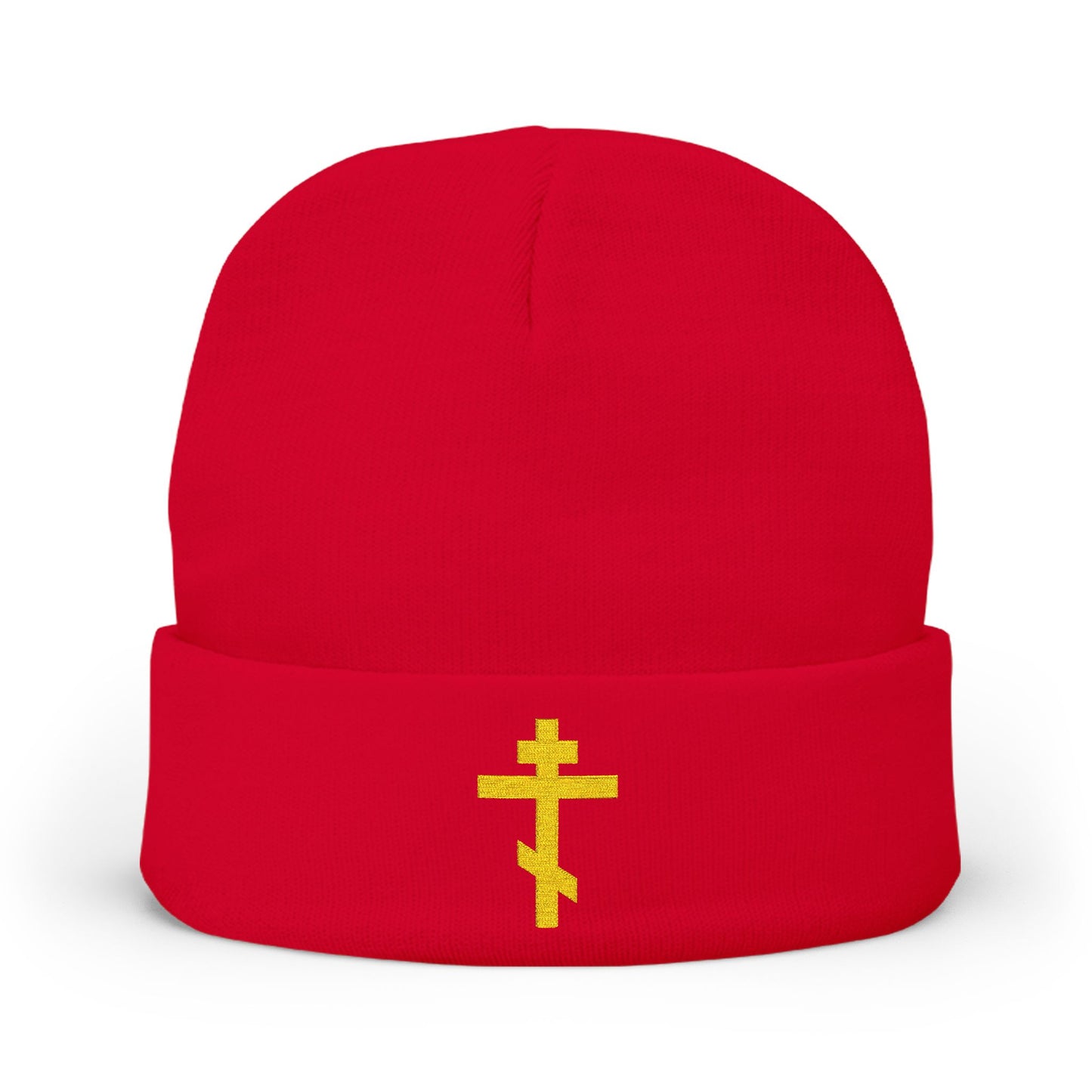 Red knit beanie featuring a yellow Orthodox TriBar cross embroidered on the front with "Nail My Passions to the Wood of Thy Precious Cross O Lord"—a symbol of Orthodox Christian faith and salvation.