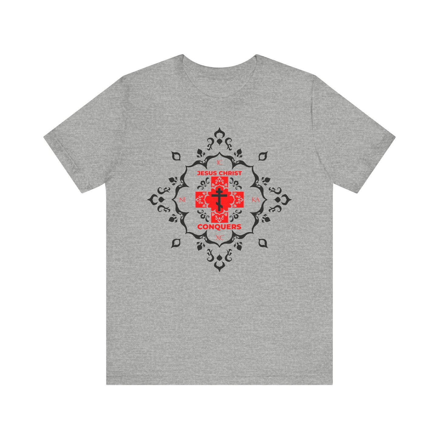 Athletic Heather t-shirt featuring a distinctive white Orthodox cross, bold "ICXC NIKA | Jesus Christ Conquers" text in modern red font at the center, and medieval black filigree design—a striking expression of victory over sin and inspiration from St John Chrysostom.