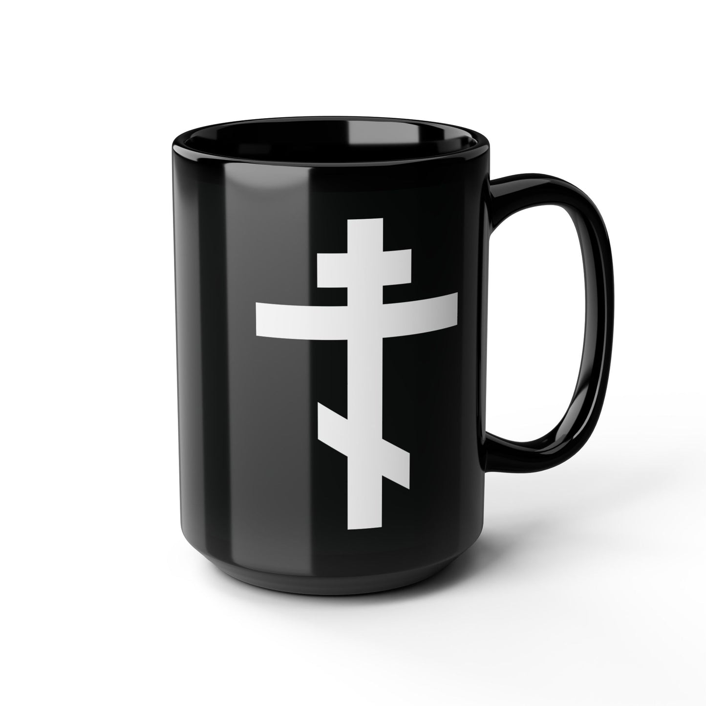 A black mug with a white Orthodox cross and the inscription “May I never boast, except in the cross of our Lord Jesus Christ” (Gal 6:14), inspired by St. John of Kronstadt and the Saviour’s sacrifice.
