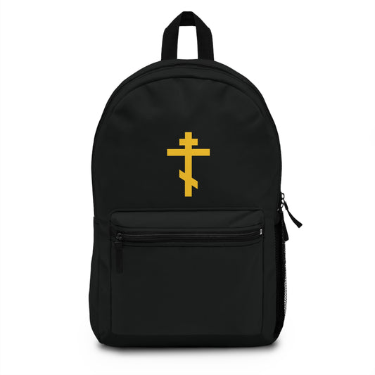 Orthodox Christian backpack featuring a yellow Orthodox cross on black, symbolizing the precious, life-giving weapon of unseen warfare and scourge of demons.
