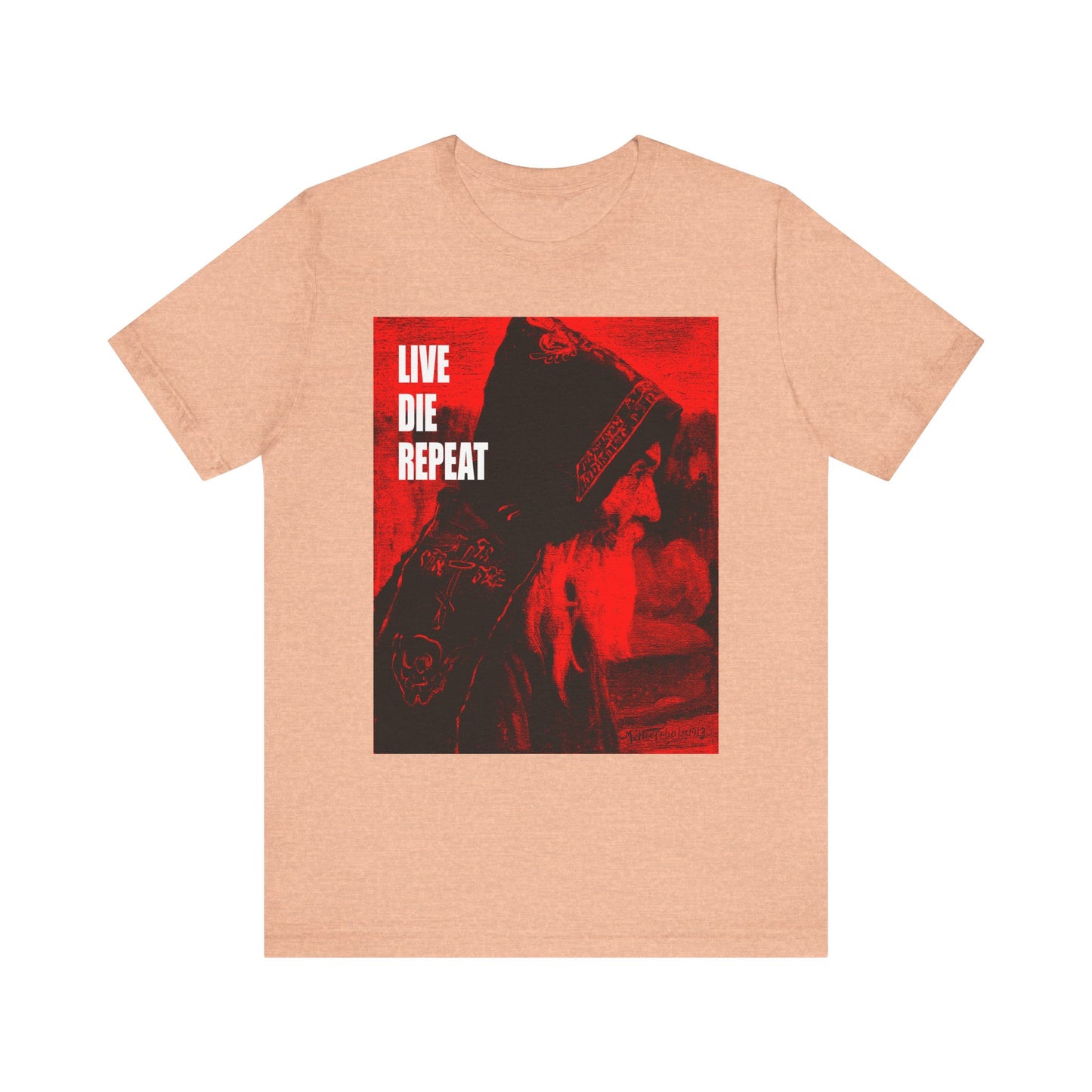 Heather Peach unisex tee featuring Orthodox monk art by Mikhail Nesterov, with "Live Die Repeat" in white text—a nod to ascetic resilience. Lightweight cotton for comfort.