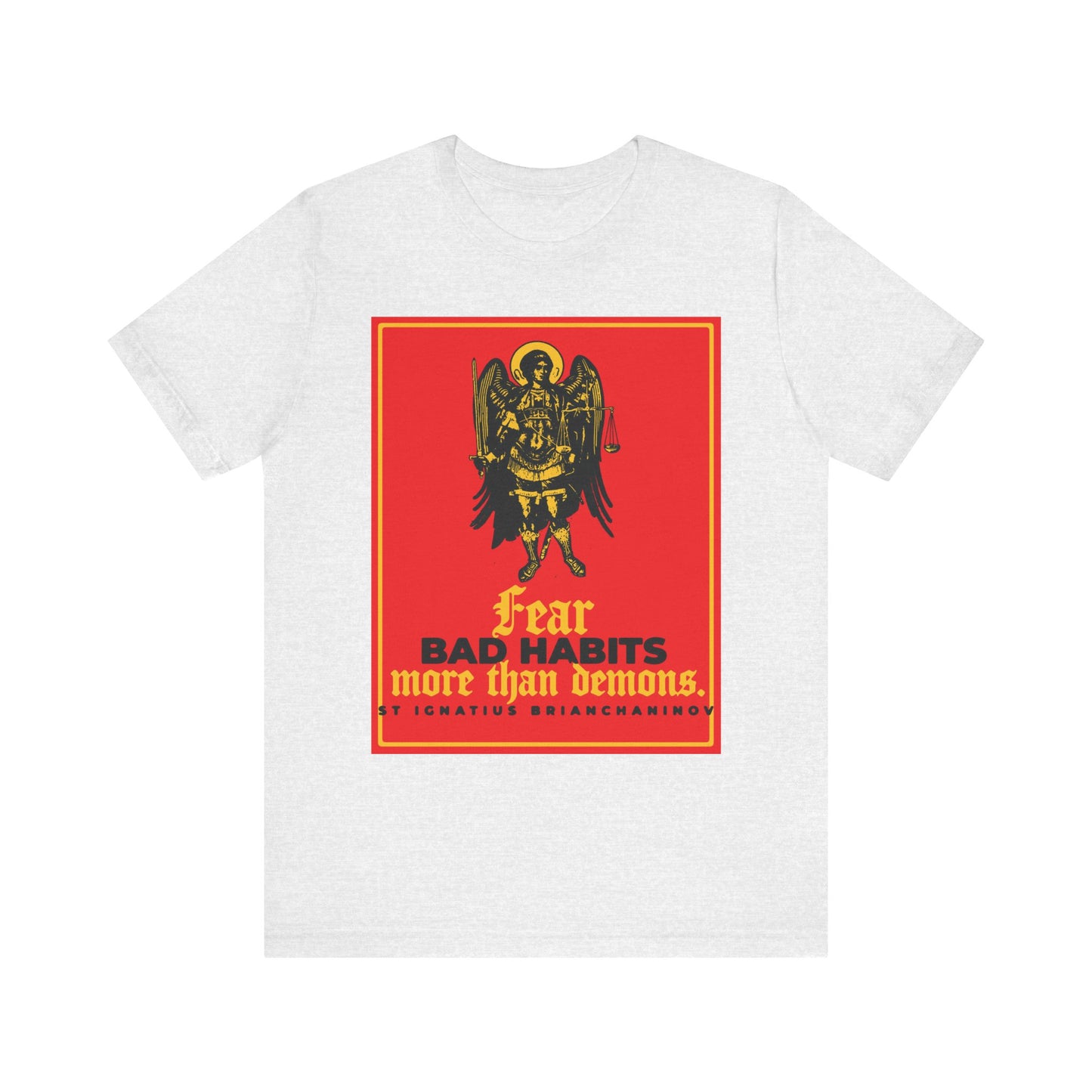 Ash-colored unisex cotton tee featuring Archangel Michael and St Ignatius Brianchaninov’s quote: "Fear bad habits more than demons," inspiring you to resist immoral habits in your spiritual journey.