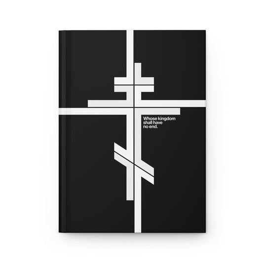 Black hardcover journal featuring a modernist minimalist Orthodox cross logo, bold white intersecting lines, and the text "Whose Kingdom Shall Have No End" (Luke 1:32-33), reflecting Christ’s enduring promise.