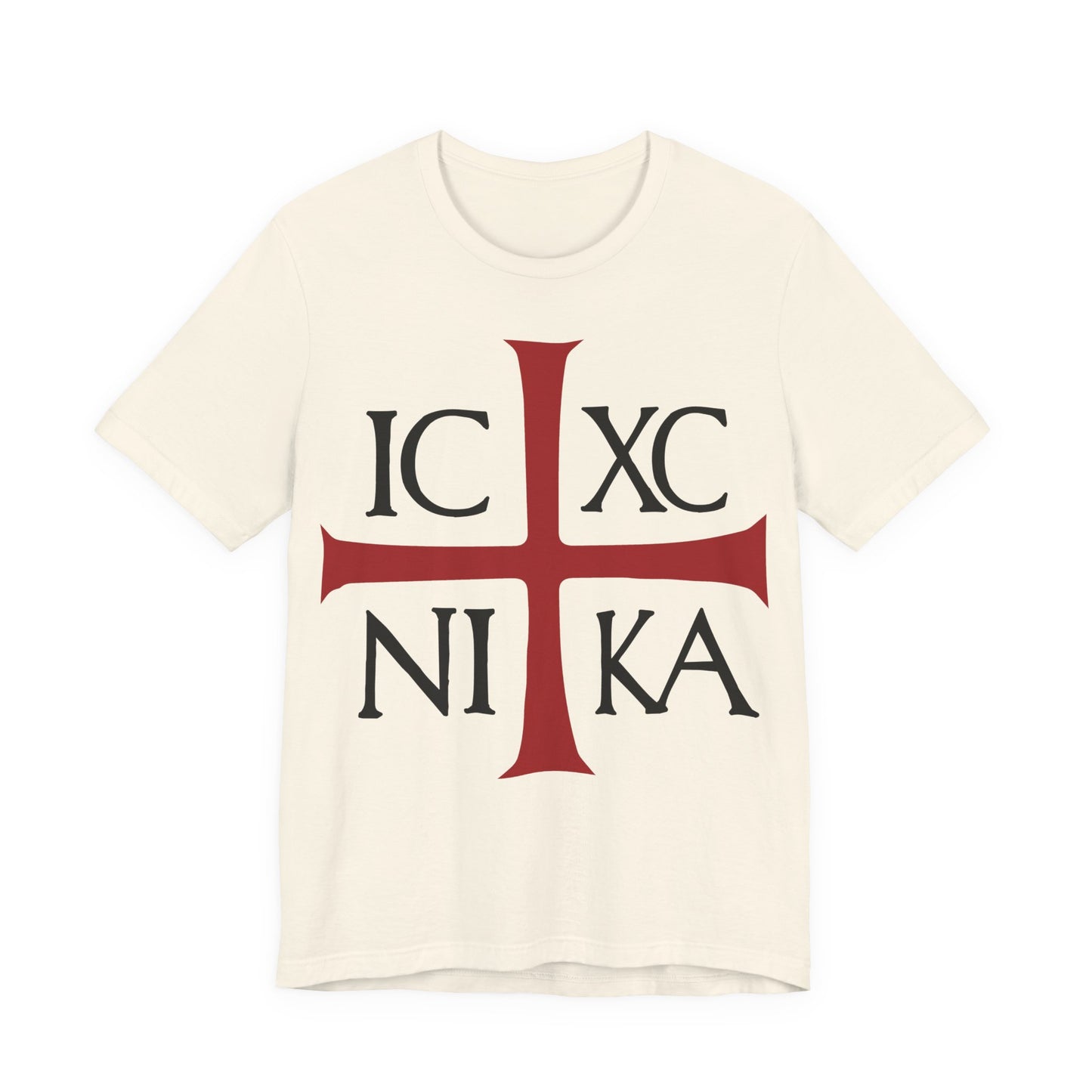 Natural cotton T-shirt featuring a bold red cross and black ICXC NIKA—an ancient Byzantine Christogram meaning "Jesus Christ Conquers"—inspired by Philippians 2:9-11.