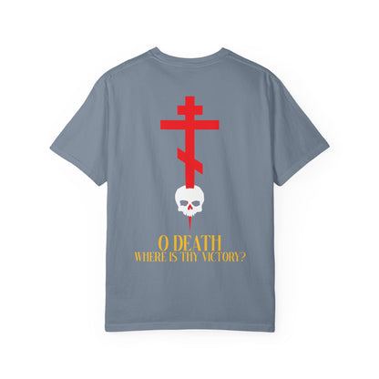 Introducing the "O Death Where is Thy Victory?" unisex heavyweight cotton tee, featuring a bold red Orthodox cross on the front left chest and an eye-catching design of a cross stabbing a skull alongside yellow text on the back, inspired by the hope of the Resurrection.