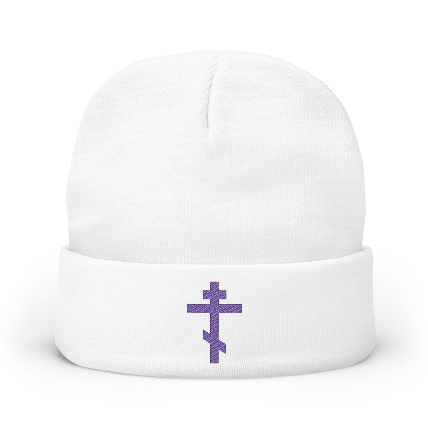 White beanie with an embroidered blue-purple Orthodox TriBar Cross on the front, inspired by the prayer "Nail My Passions to the Wood of Thy Precious Cross O Lord.