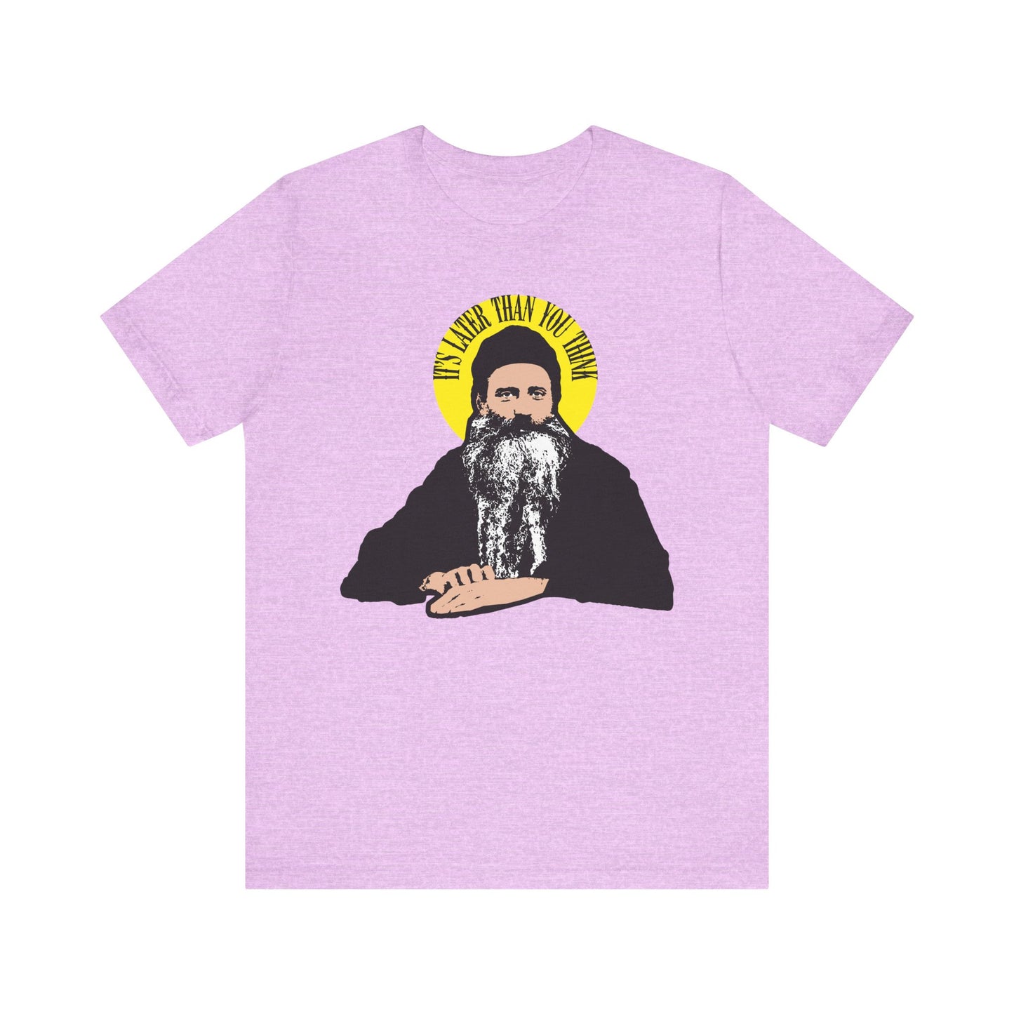Heather Prism Lilac tee featuring St. Seraphim Rose with the quote "It's Later Than You Think" in a yellow halo—a modern American Orthodox saint tribute in lightweight cotton.