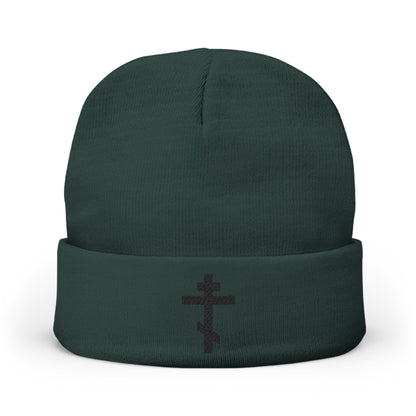 Dark green knit beanie featuring a black Orthodox TriBar Cross with "Nail My Passions to the Wood of Thy Precious Cross O Lord" embroidered on the front cuff. Orthodox Christian embroidered beanie.