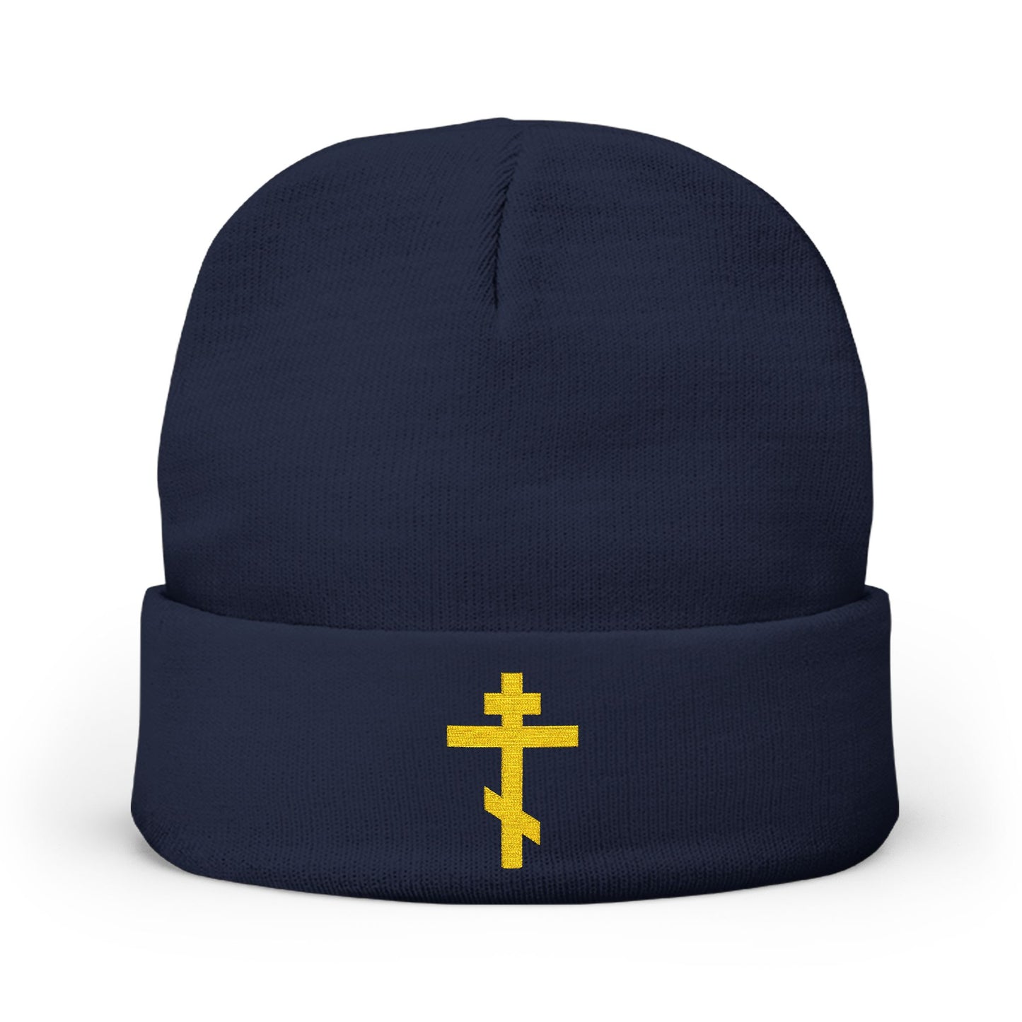 Dark navy knit beanie featuring a simple yellow Orthodox TriBar Cross and the inscription "Nail My Passions to the Wood of Thy Precious Cross O Lord." Orthodox Christian embroidered design.
