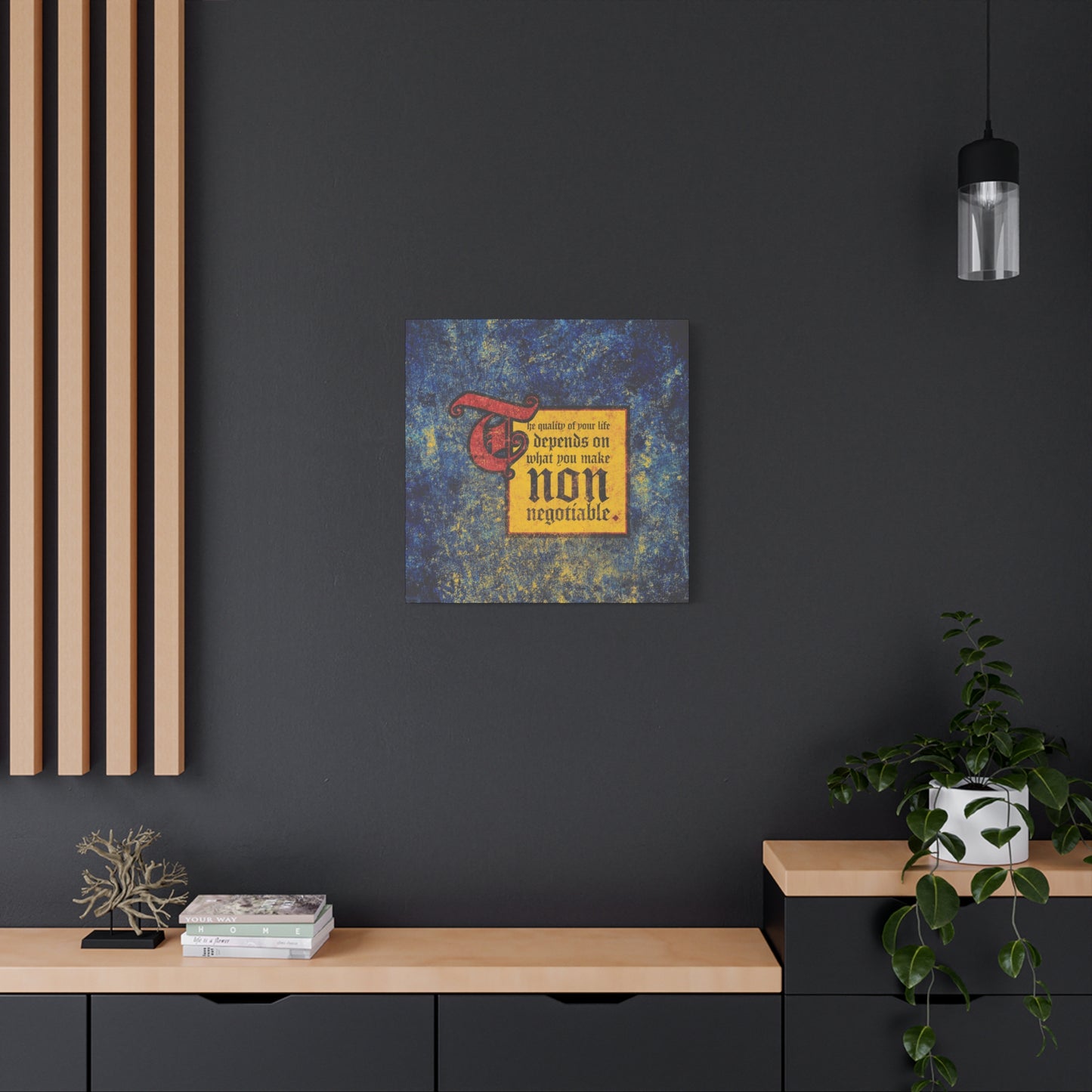 The Quality of Your Life Depends on What You Make Non-Negotiable" Christian wall art hangs above a modern cabinet and plant, making a bold motivational statement and inspiring uncompromising faith in your space.