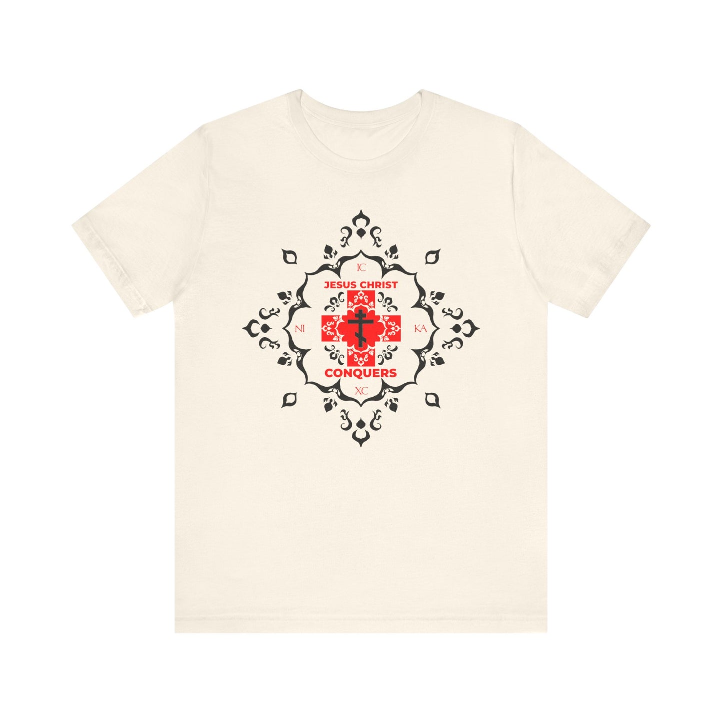 Natural t-shirt featuring a white Orthodox cross with "Jesus Christ Conquers" in red modern font and medieval filigree design—a powerful symbol of victory over sin inspired by the teachings of St John Chrysostom.