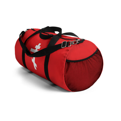 White Orthodox Cross Red Background duffel bag with black straps, mesh pocket on the end, and Galatians 6:14: "May I never boast, except in the cross of our Lord Jesus Christ." Perfect for Orthodox Christians.