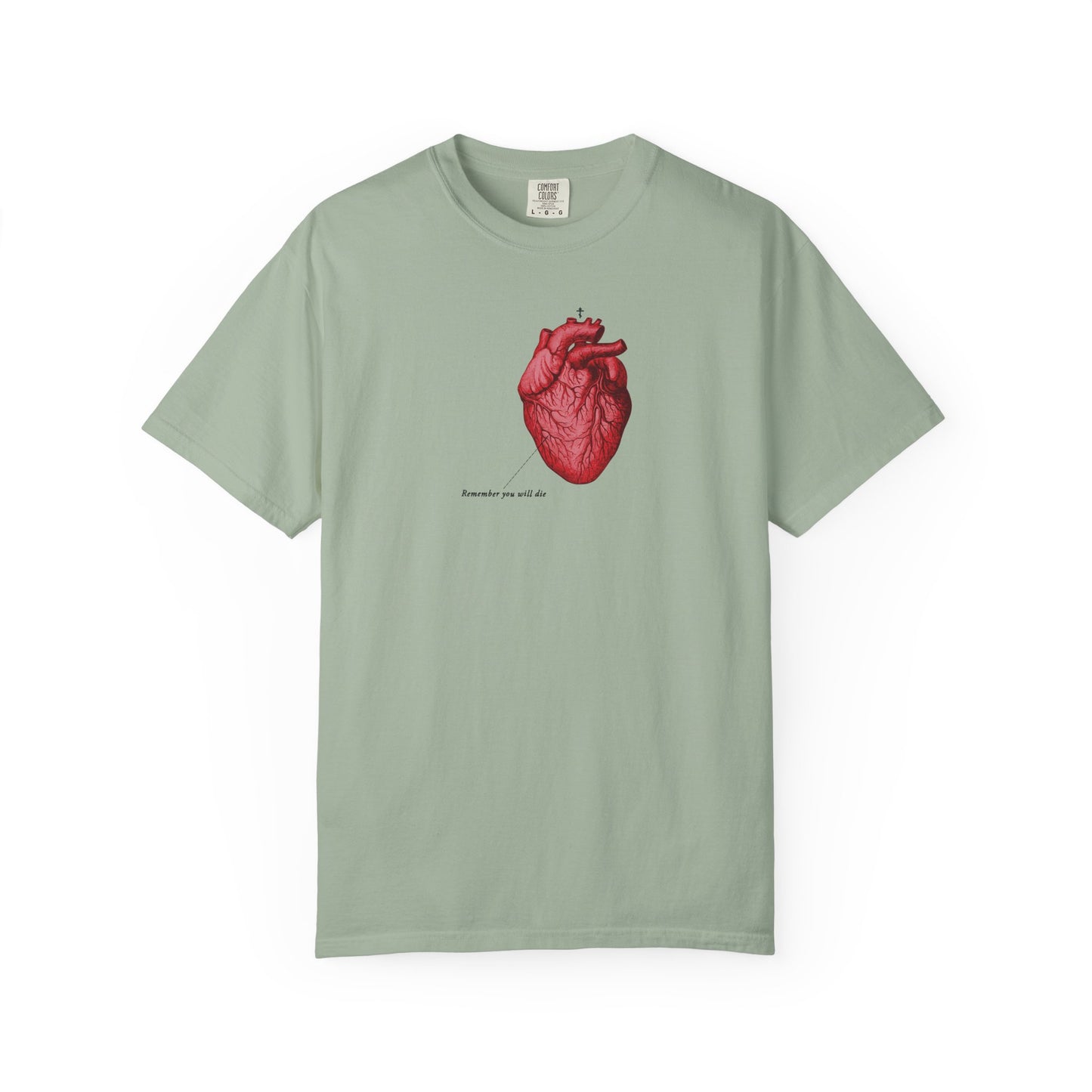 Bay-colored heavyweight cotton unisex t-shirt with a retro medical textbook heart and "remember you will die" printed below—a subtle memento mori and reminder of repentance and God's Mercy.