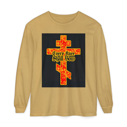 Tan long sleeve features a gold and red floral Orthodox cross with Gothic "Every Knee Shall Bow" text, inspired by Isaiah 45:22-24 and Philippians 2:7-11, celebrating Jesus Christ’s righteousness.