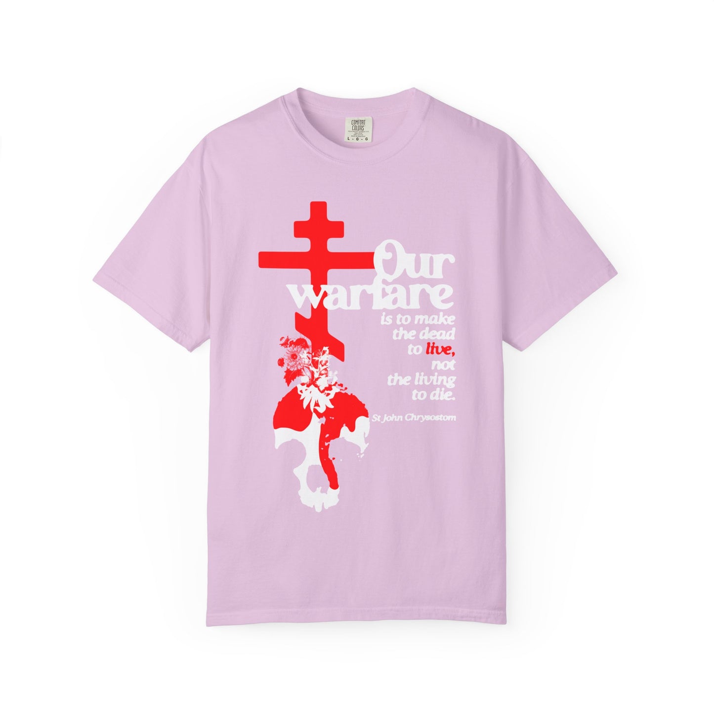 Orchid-colored heavyweight cotton unisex tee titled "Our Warfare is the Make the Dead to Live (St. John Chrysostom)" features an Orthodox cross, floral accents, and a skull illustration; adorned with a profound quote on warfare inspired by St. John Chrysostom that reflects the enduring power of the Christian faith.