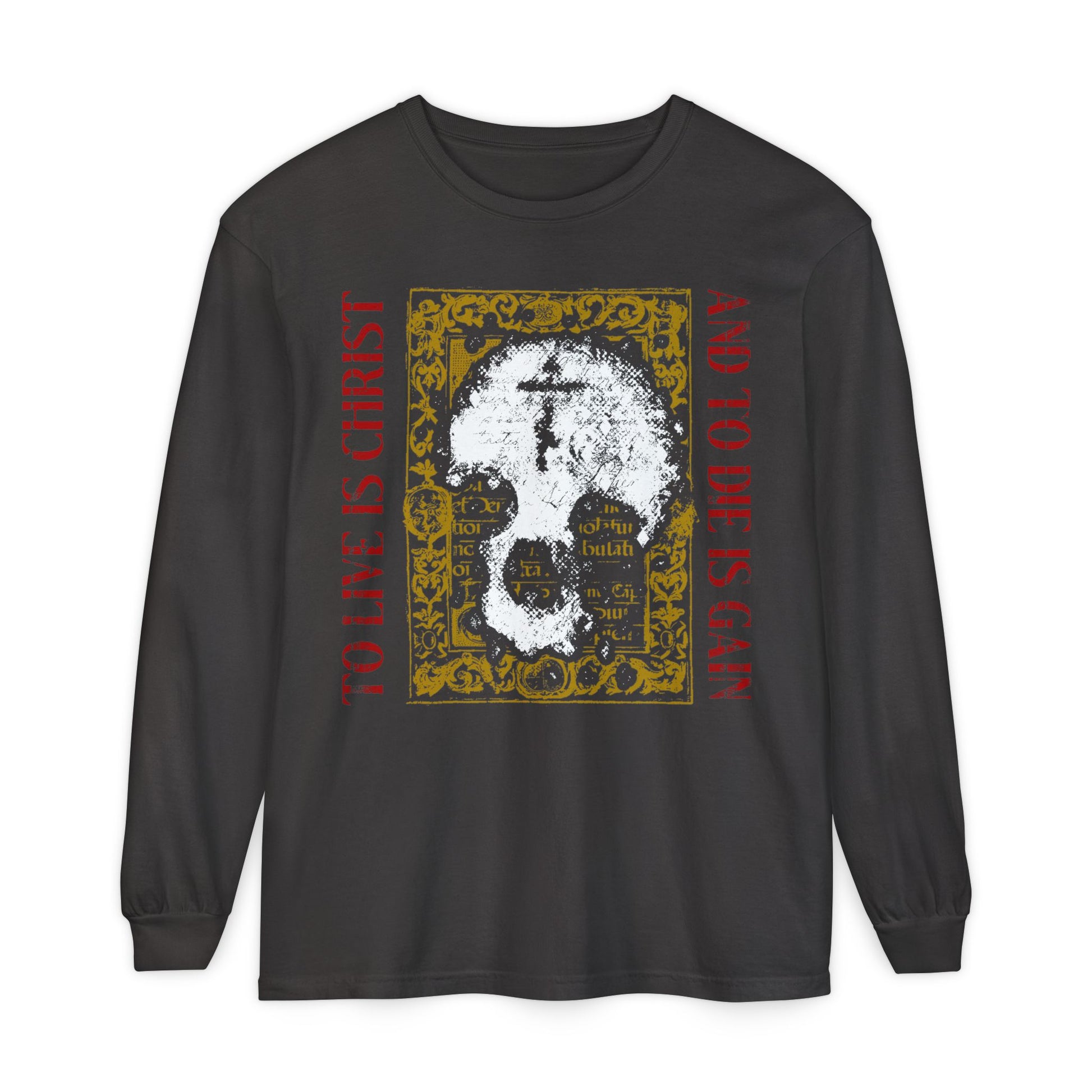 Graphite long-sleeve shirt featuring a skull with a cross on a gold manuscript background and "To Live is Christ, to Die is Gain" (Philippians 1:21), expressing the Orthodox Christian message that Christ lives in us.