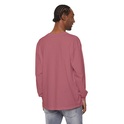 Man wearing the White Orthodox Cross Long Sleeve Shirt, featuring a subtle cross design and the quote "May I never boast, except in the cross of our Lord Jesus Christ" (Gal 6:14), standing with his back to the camera in light jeans.