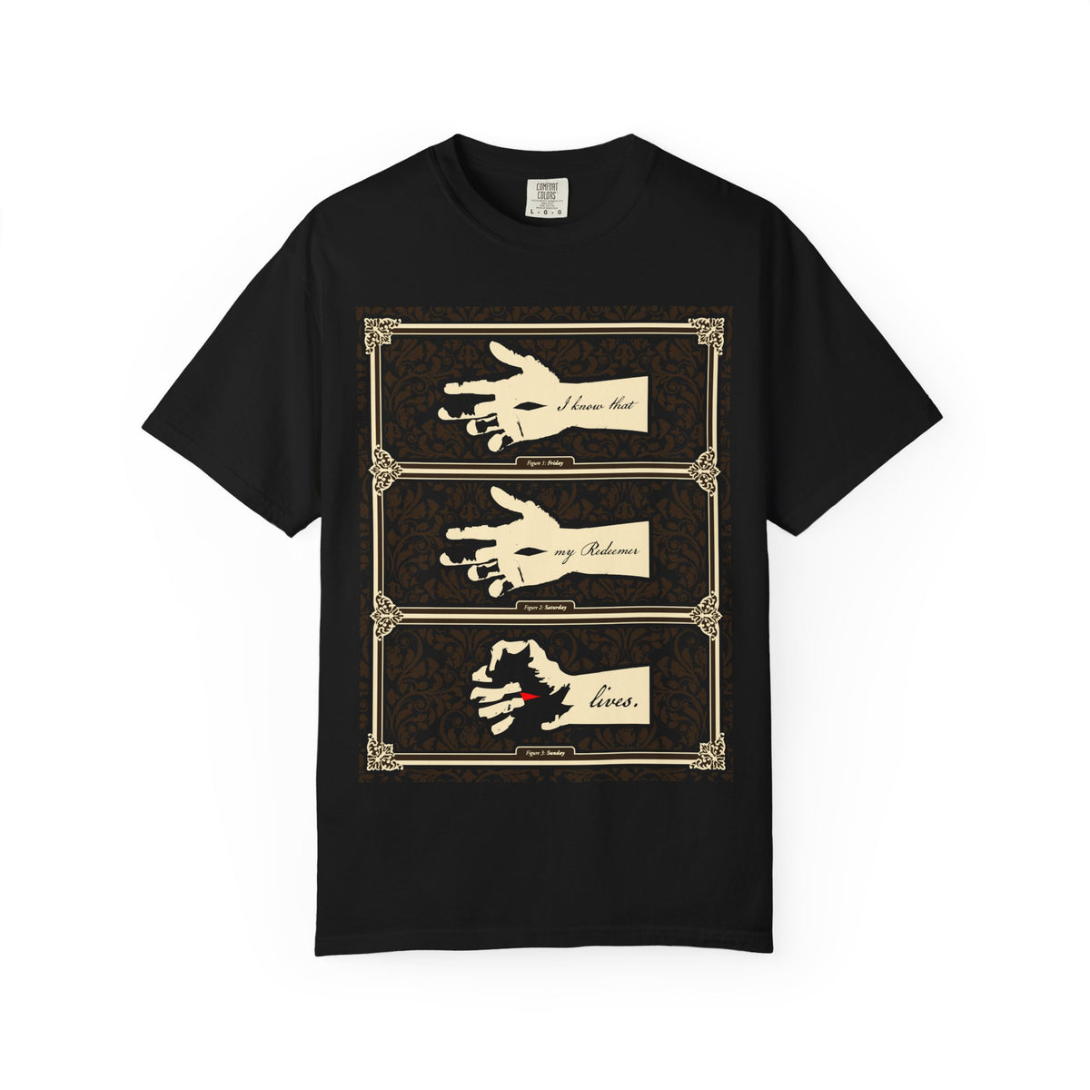 Black heavyweight cotton unisex tee in earthtone Americana style, featuring three illustrated hands of the crucified Christ and the phrase “I Know That My Redeemer Lives (Job 19:25)” framed in ornate designs—subtly evoking “darkness in my paths” while affirming steadfast faith.