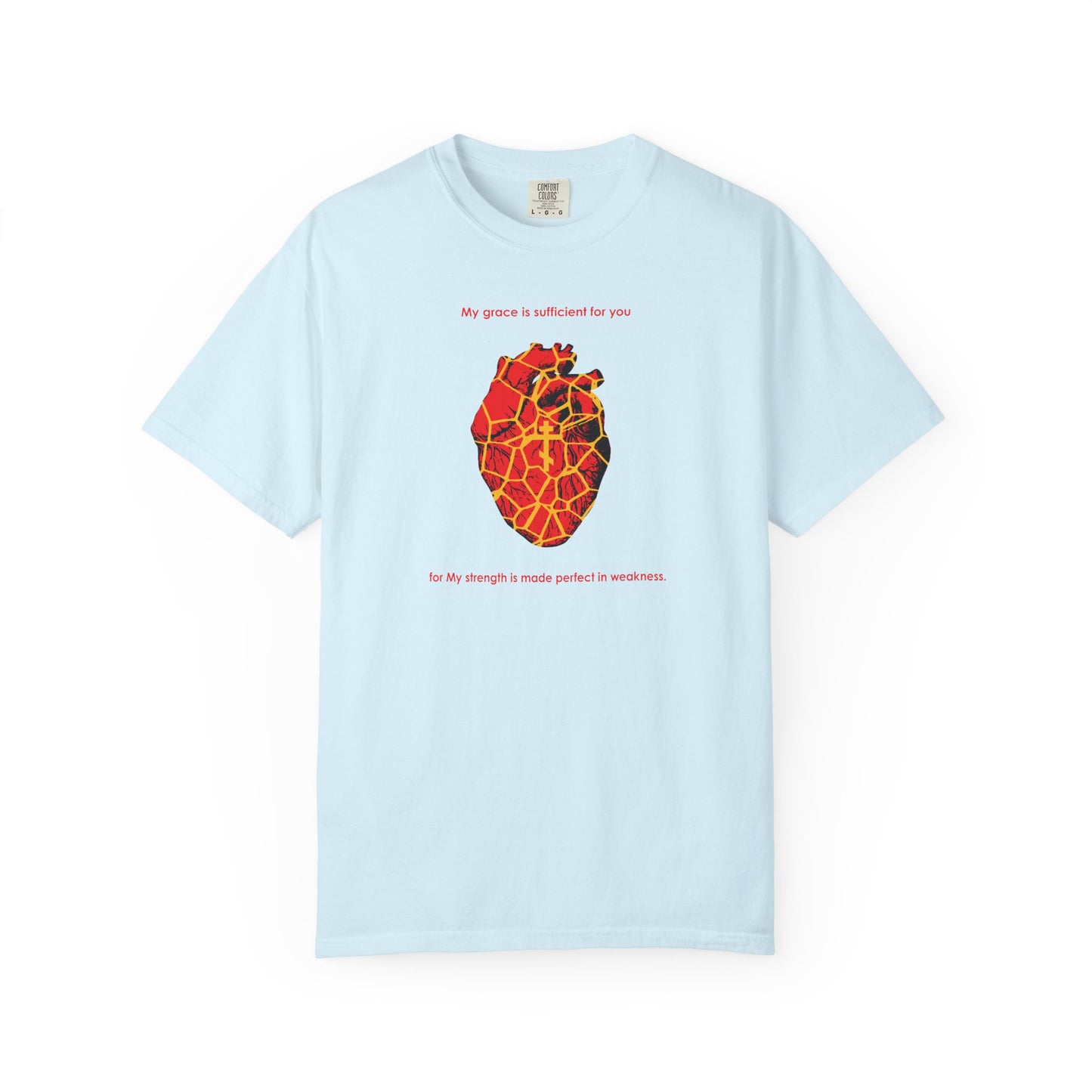 Chambray heavyweight cotton unisex tee featuring a kintsugi-style golden broken heart, an Orthodox cross, and the text "My Strength is Made Perfect in Weakness (2 Cor 12:9)"—a gentle reminder that even what is broken can be restored to beauty, just as kintsugi art celebrates golden seams.