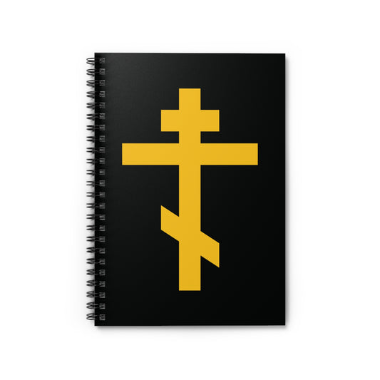 Orthodox spiral notebook with a yellow cross on black, titled "Precious and Life-Giving Weapon of Unseen Warfare | Scourge of Demons.