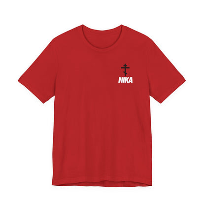 Red t-shirt featuring a small Orthodox cross and bold NIKA text, inspired by “Jesus Christ Conquers,” in a NIKE logo mashup design on the left chest. From the Athletic Ascetic Fashion Christian collection.