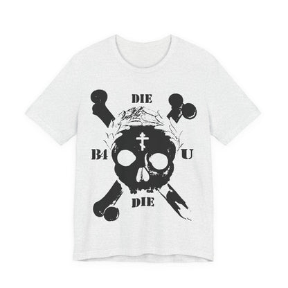 Ash t-shirt featuring a retro skull & crossbones, Orthodox cross, laurel wreath, and "Die Before You Die"—a memento mori inspired by Matthew 16:24-25 for ascetic Christians.