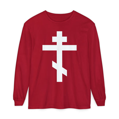 Red long-sleeve shirt with a bold white Orthodox Cross and the text “May I never boast, except in the cross of our Lord Jesus Christ” (Gal 6:14). Orthodox design inspired by faith.