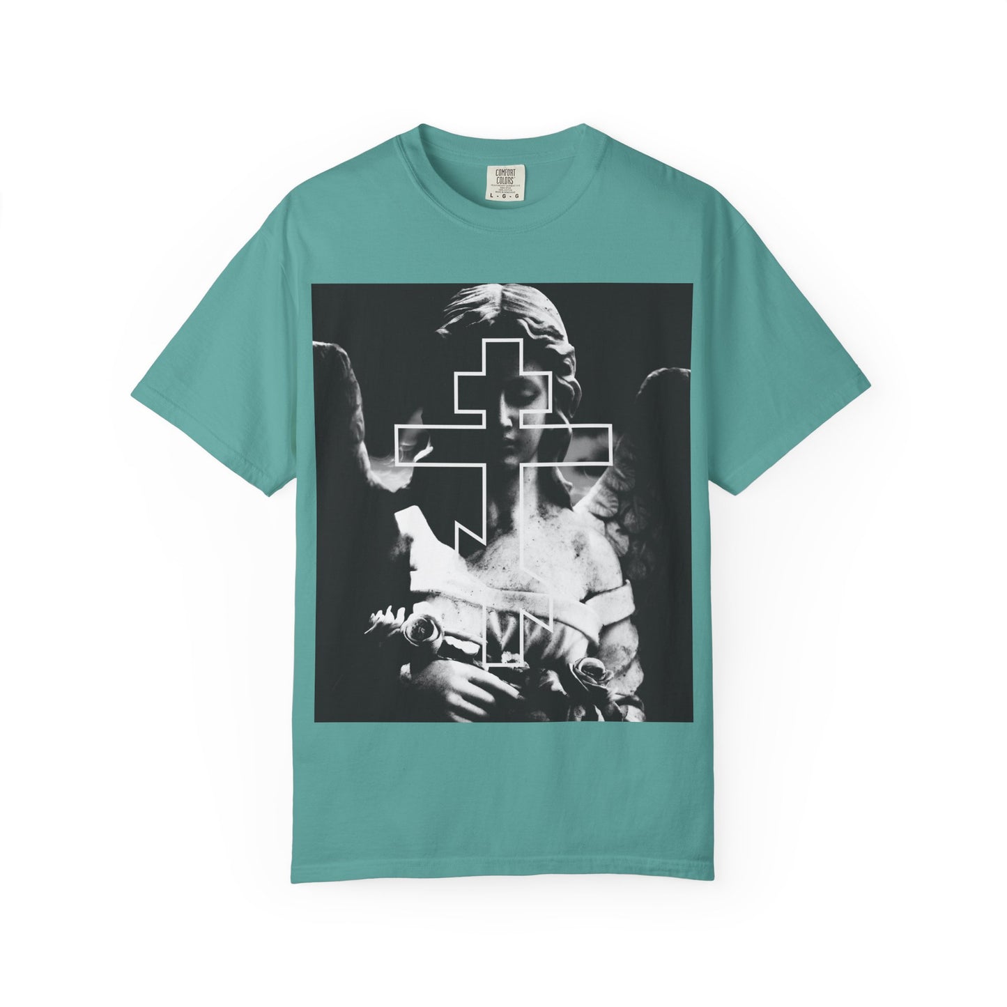 Seafoam tee featuring a grayscale goth "Cemetery Angel" with an Orthodox cross overlay. Heavyweight cotton. Unisex fit. Design evokes memento mori—"Remember You Will Die.