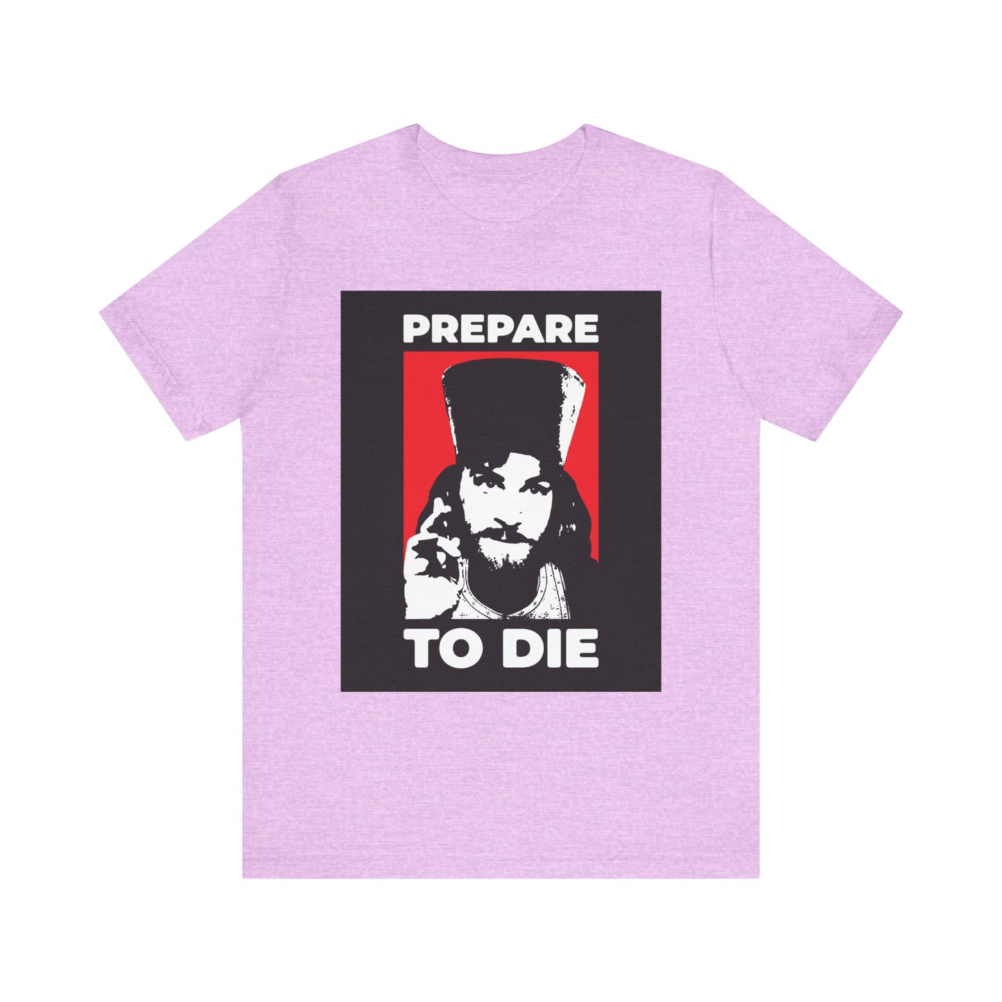 Heather Prism Lilac t-shirt featuring "Prepare to Die | Remember You Will Die" with a bold graphic of Inigo Montoya as an Orthodox priest giving a blessing, inspired by the wisdom of St. Hesychius and the Princess Bride.