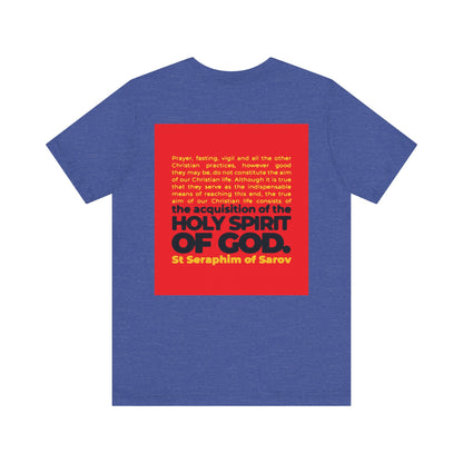 True Aim of Christian Life Orthodox tee—lightweight cotton, unisex fit—with St. Seraphim of Sarov quote and iconography on the back in bold yellow, highlighting the call to acquire the Holy Spirit.