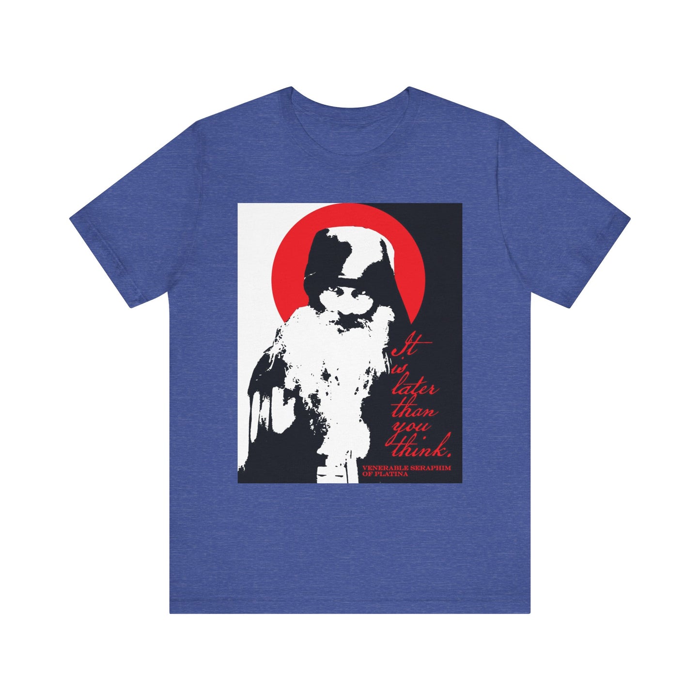 Heather True Royal t-shirt featuring a high-contrast black, white, and red design of Fr Seraphim Rose—a stylized white-bearded figure inspired by Orthodox spiritual life—set against a red circle with red text that reads, “It is later than you think.” Lightweight cotton unisex fit; Memento Mori collection.