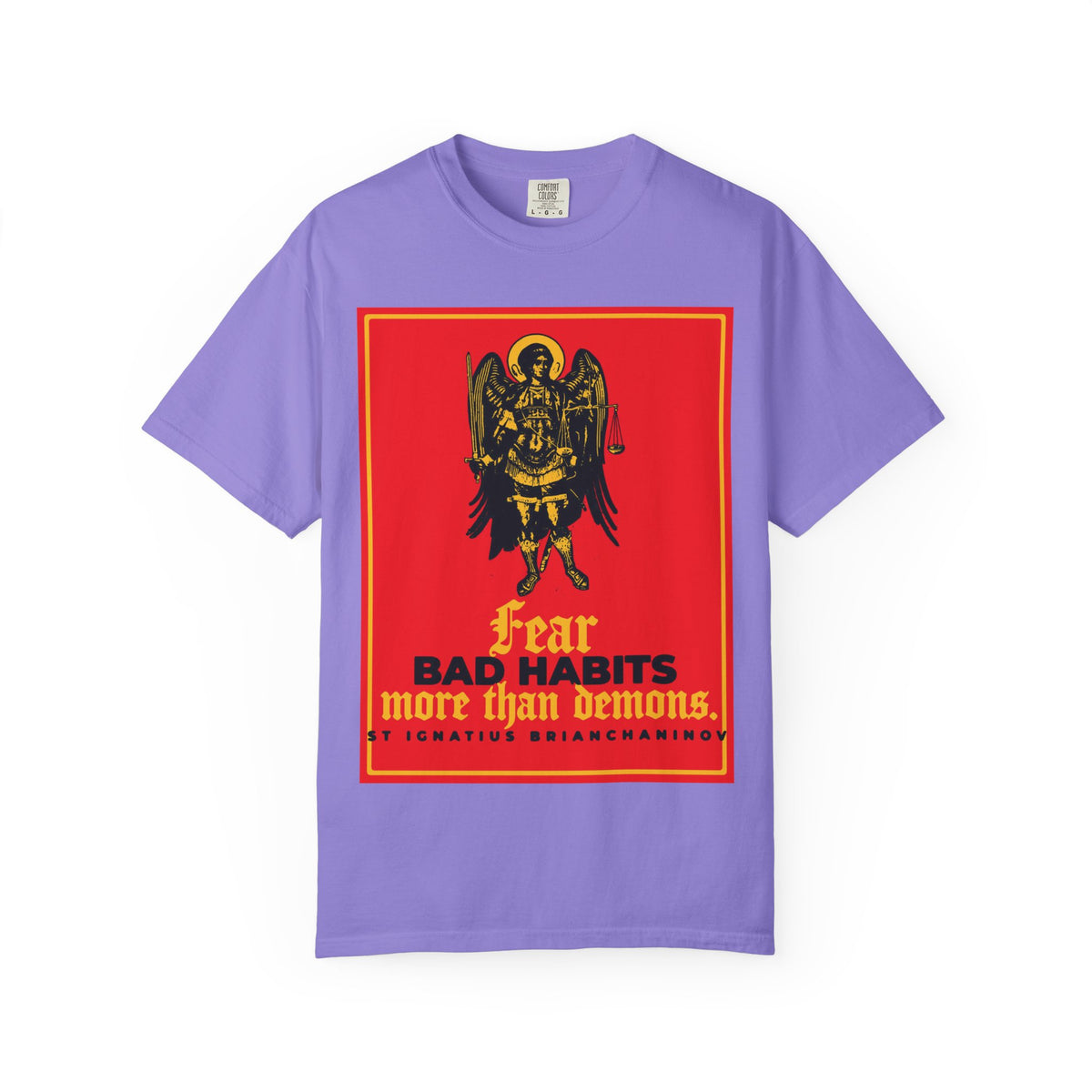 Violet unisex heavyweight cotton t-shirt featuring an icono-graphic of Archangel Michael and the quote: “Fear bad habits more than demons” by St Ignatius Brianchaninov—a striking Orthodox tee for those battling for spiritual and moral freedom.
