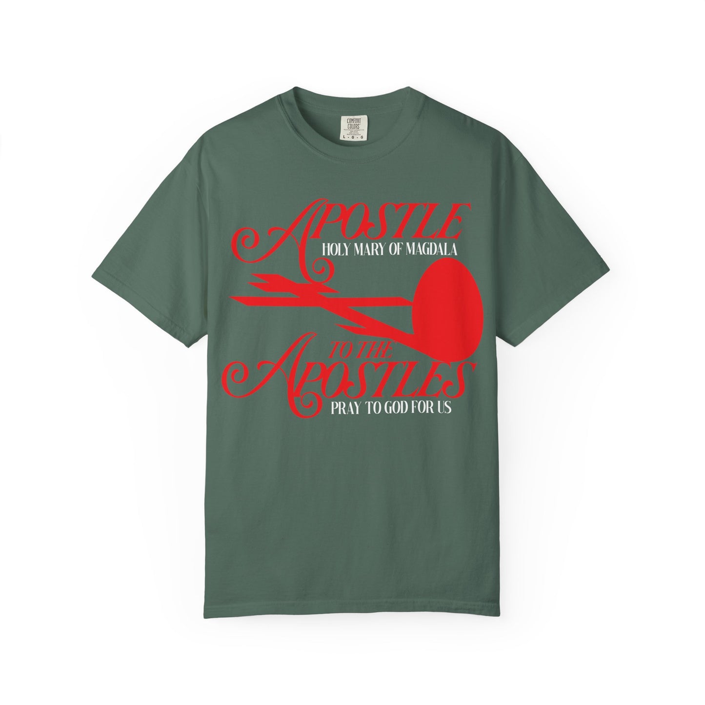 Blue spruce tee featuring red text that reads “Apostle to the Apostles” and a red abstract design on the front, inspired by St. Mary Magdalene’s role as Apostle to the Apostles and her connection to Orthodox Christian tradition, including symbols like the red cross and red egg.