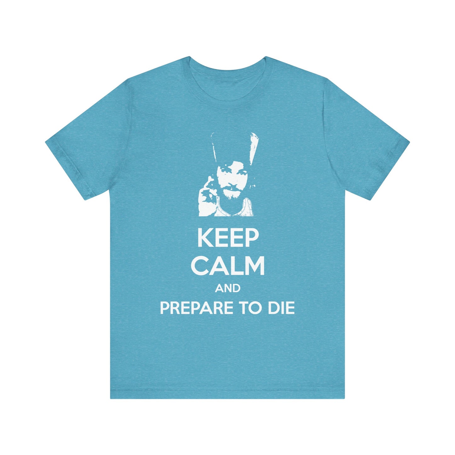 Heather aqua tee featuring the phrase "KEEP CALM AND PREPARE TO DIE" in white text with a stylized face graphic above—a bold and playful nod to Father Inigo Montoya of The Princess Bride, blending meme culture with Orthodox Christian themes on a lightweight cotton unisex shirt.