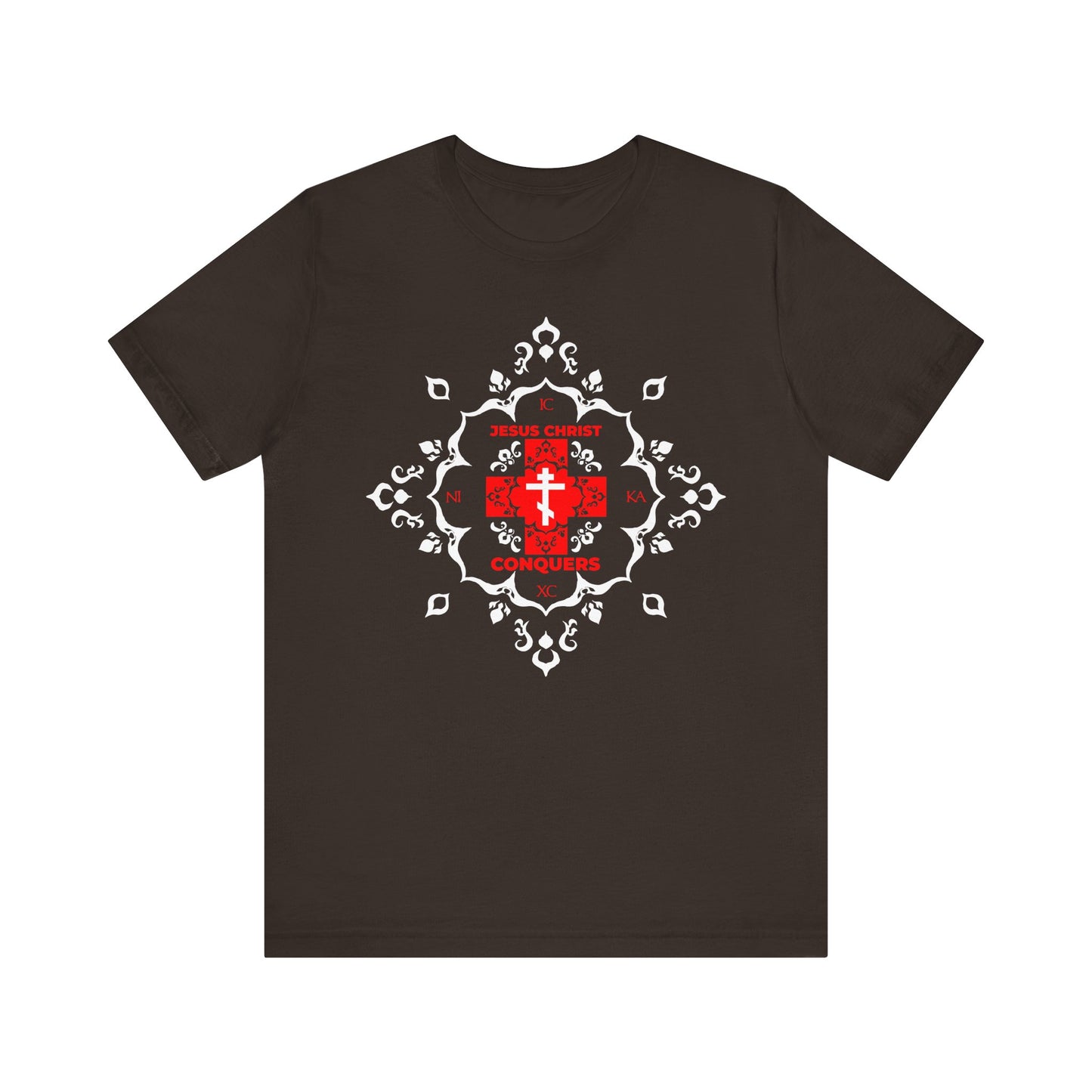 Brown t-shirt featuring a white Orthodox cross and the bold red "ICXC NIKA | Jesus Christ Conquers" text in modern font, surrounded by medieval filigree designs—symbolizing St. John Chrysostom’s message of victory over sin and the triumph over flesh.