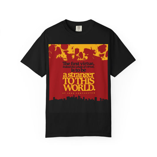 Black heavyweight cotton t-shirt featuring “Be a Stranger To this World” (St John Chrysostom), skulls, and cityscape graphic—Orthodox Christian unisex tee inspired by Hebrews 11:13-16.